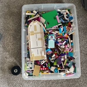 A large bin full of girl legos.